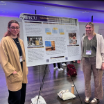 Undergraduate Researchers: Nina Carrillo-Corujo (left) and Julia Kohake (right) posed with their poster at RCAW 2023.